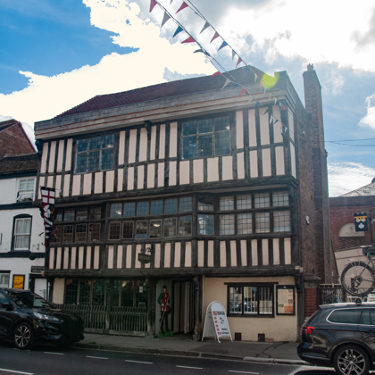 The exterior of Tewkesbury Museum a timber framed building 
